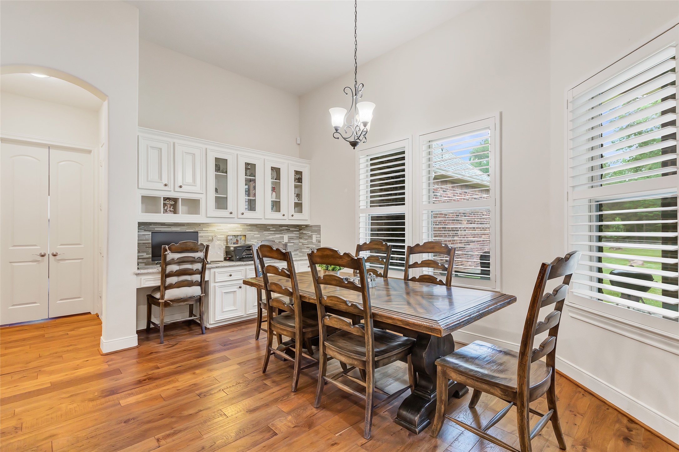 229 Sundog Road Huntsville, TX 77340 - Photo 25 of 50 Now we see the spacious Breakfast Room with a built in desk and more cabinets!