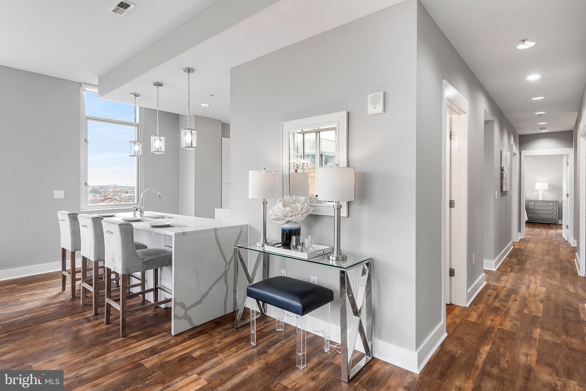 1101 Locust Street, Unit 8B Philadelphia, PA 19107 - Photo 14 of 36 a view of a kitchen and dining room
