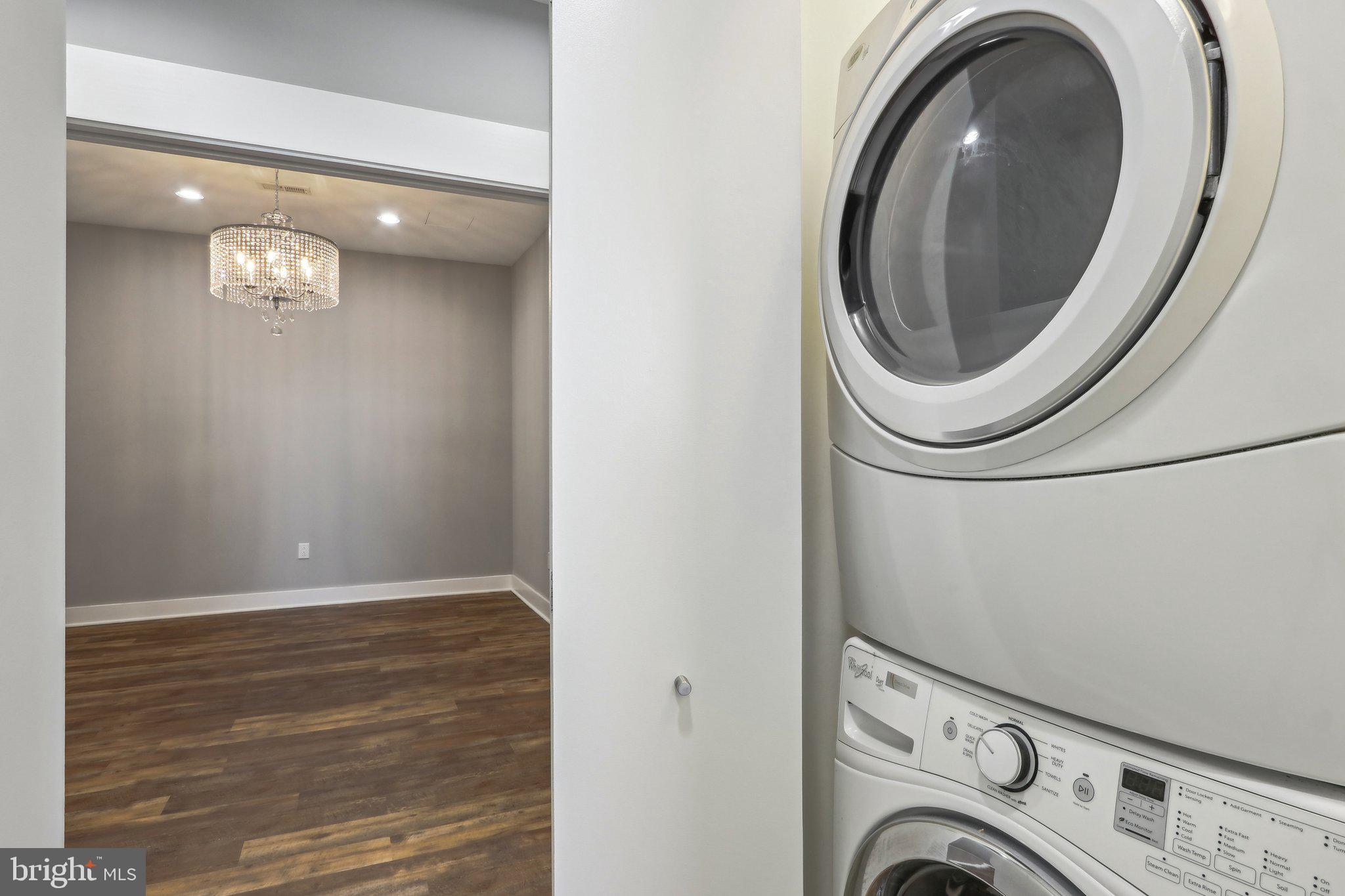 1101 Locust Street, Unit 8B Philadelphia, PA 19107 - Photo 16 of 36 a utility room with dryer and washer