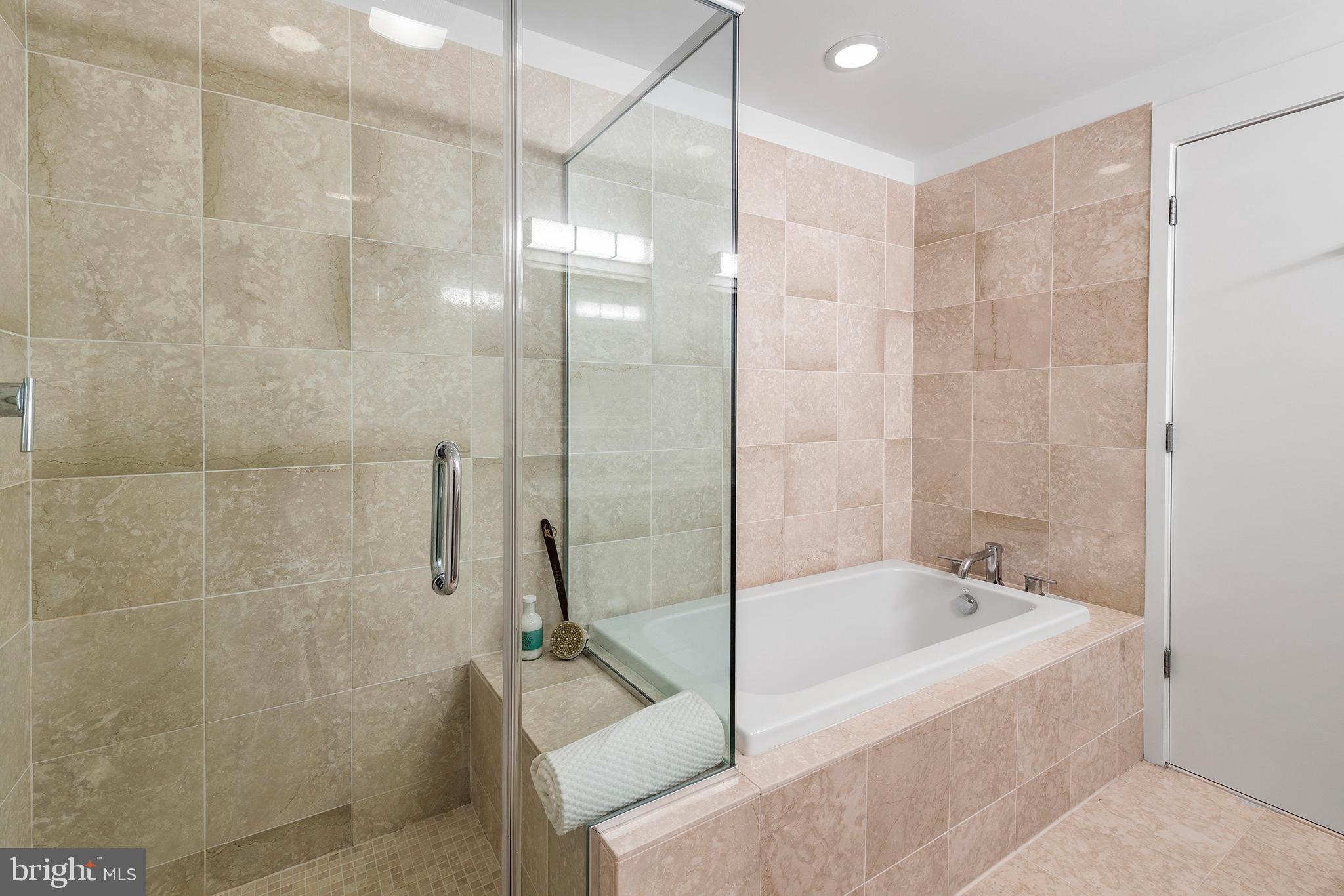 1101 Locust Street, Unit 8B Philadelphia, PA 19107 - Photo 30 of 36 a bathroom with a bathtub and shower