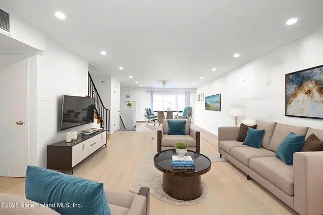 a bedroom with a bed and a table