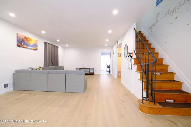 a bathroom with a sink double vanity and a mirror