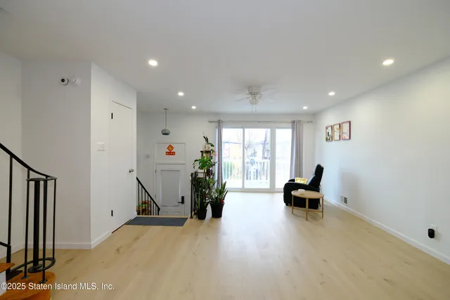 a bathroom with a sink a toilet a shower and a mirror