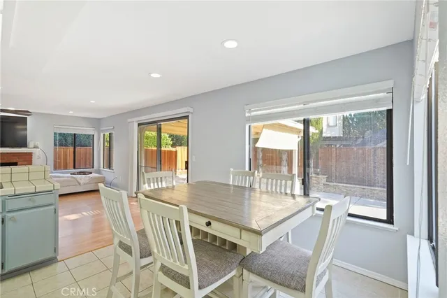 a bathroom with a double vanity sink toilet mirror and shower