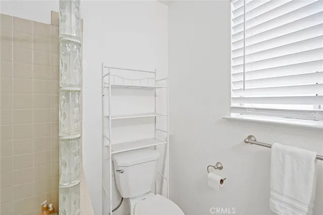 a bathroom with a sink double vanity and a mirror