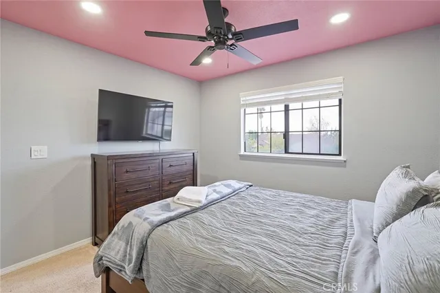 a bathroom with double sink and a mirror