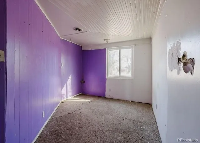 a bathroom with a bathtub sink vanity and mirror