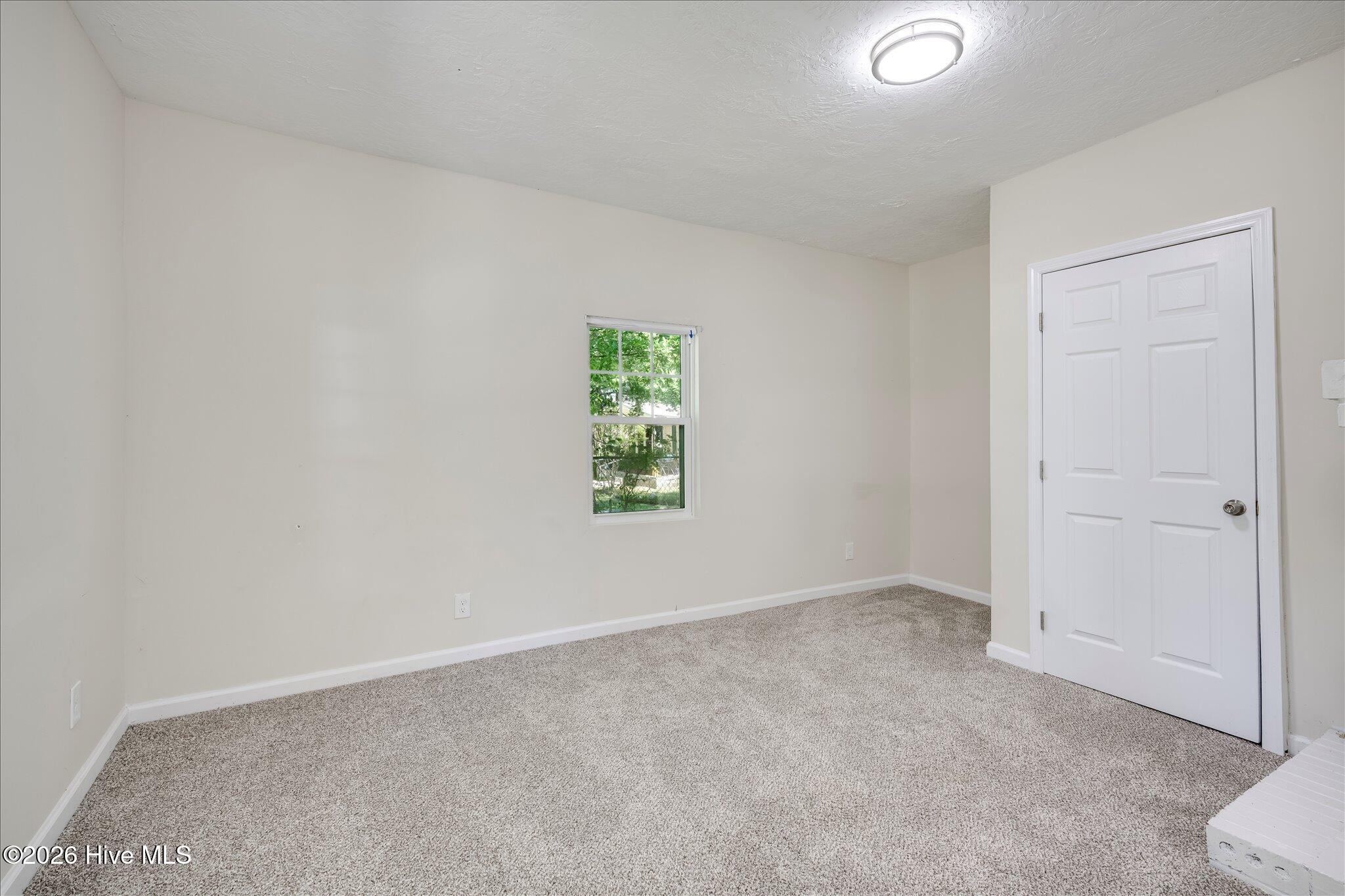 124 West Street Thomson, GA 30824 - Photo 15 of 28 Front Bedroom