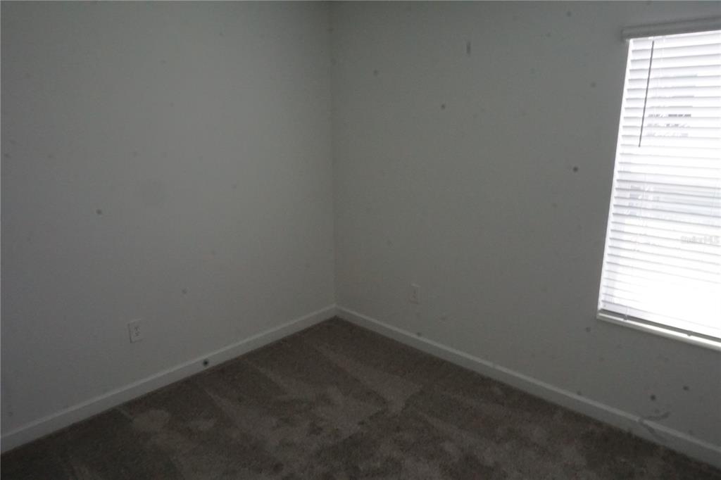 5704 Stephens Road St. Cloud, FL 34771 - Photo 10 of 12 a small space with a window