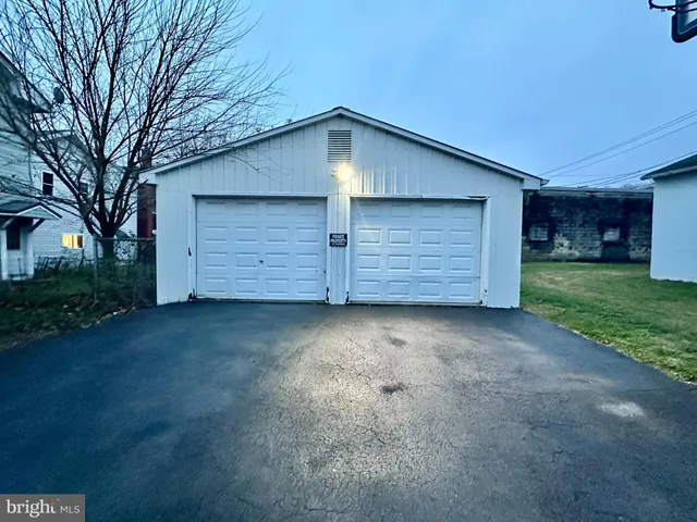 a view of a house with a garage
