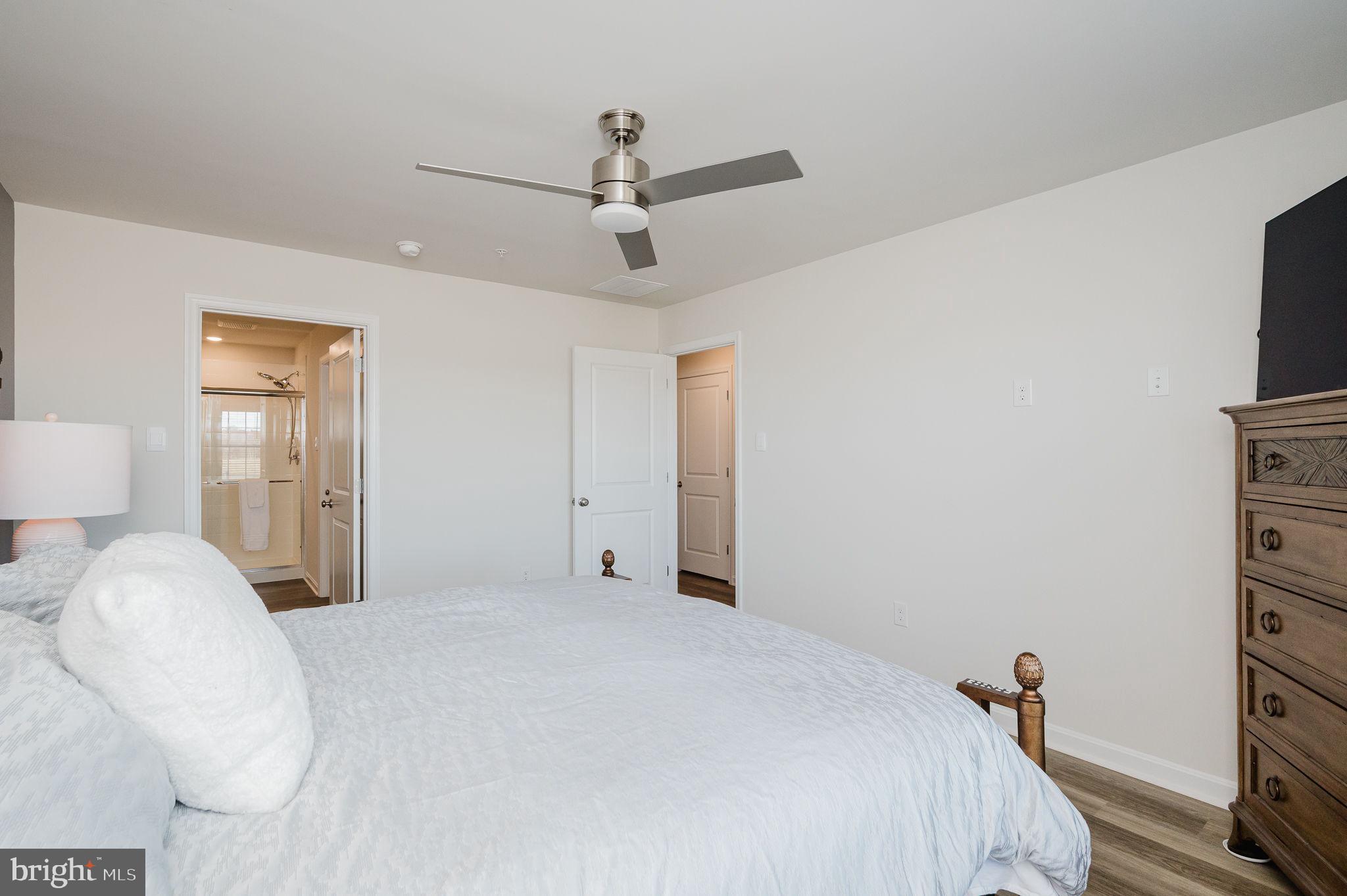 668 Beadlilly Way Joppa, MD 21085 - Photo 24 of 47 a bedroom with a bed and a tv