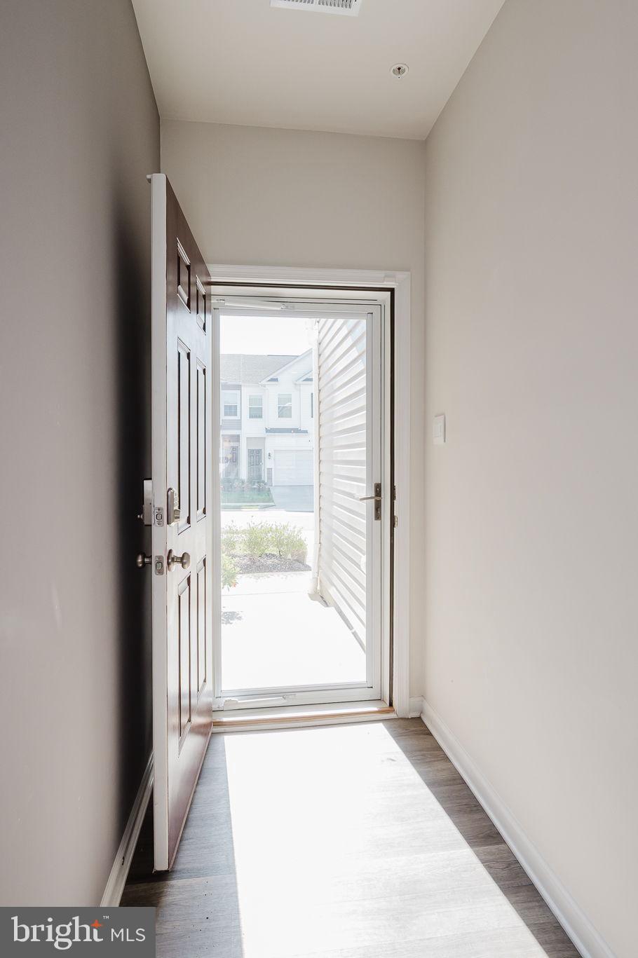 668 Beadlilly Way Joppa, MD 21085 - Photo 3 of 47 a view of an empty room with a window