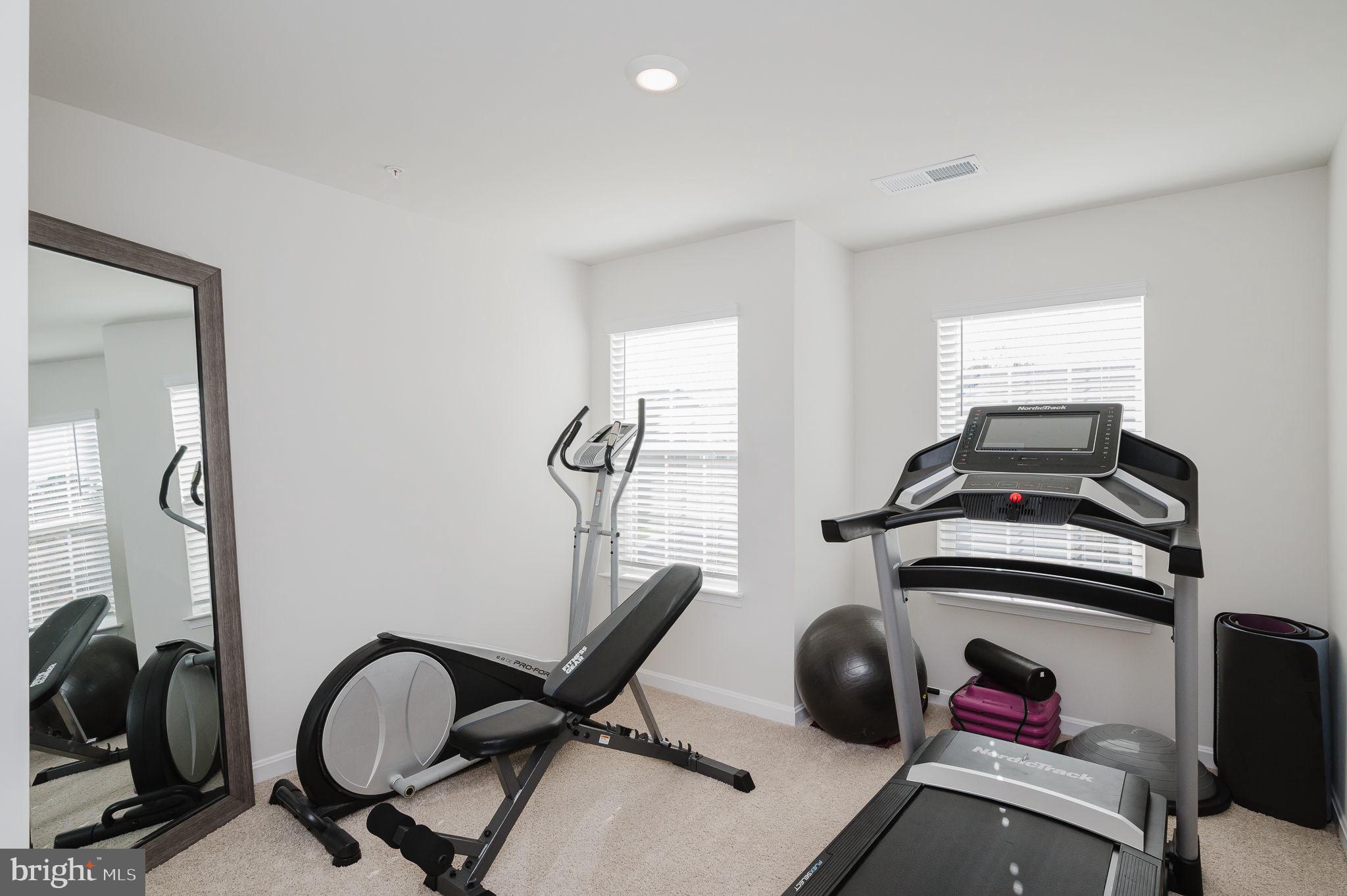 668 Beadlilly Way Joppa, MD 21085 - Photo 32 of 47 a view of a workspace with furniture and gym equipment