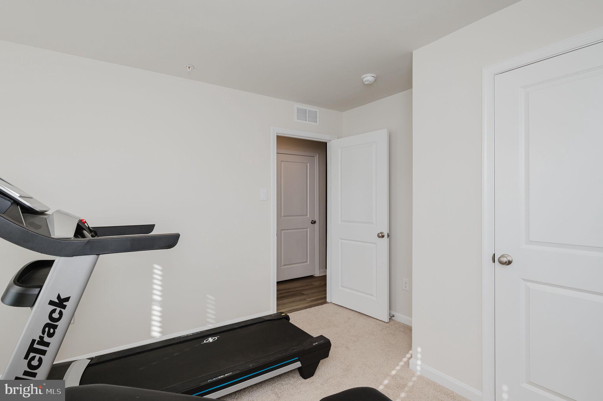 668 Beadlilly Way Joppa, MD 21085 - Photo 33 of 47 a room with a desk and a chair