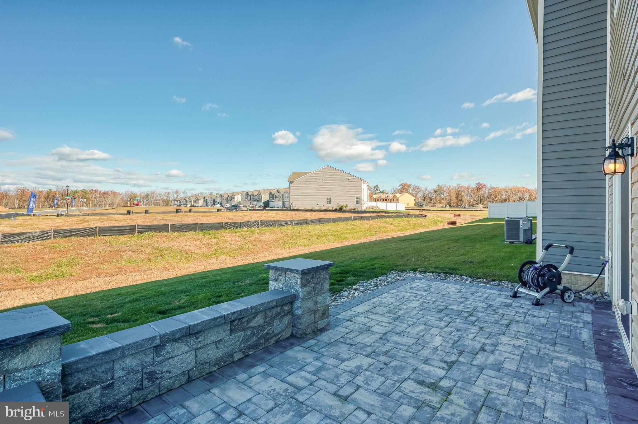 668 Beadlilly Way Joppa, MD 21085 - Photo 41 of 47 a view of a lake with a big yard