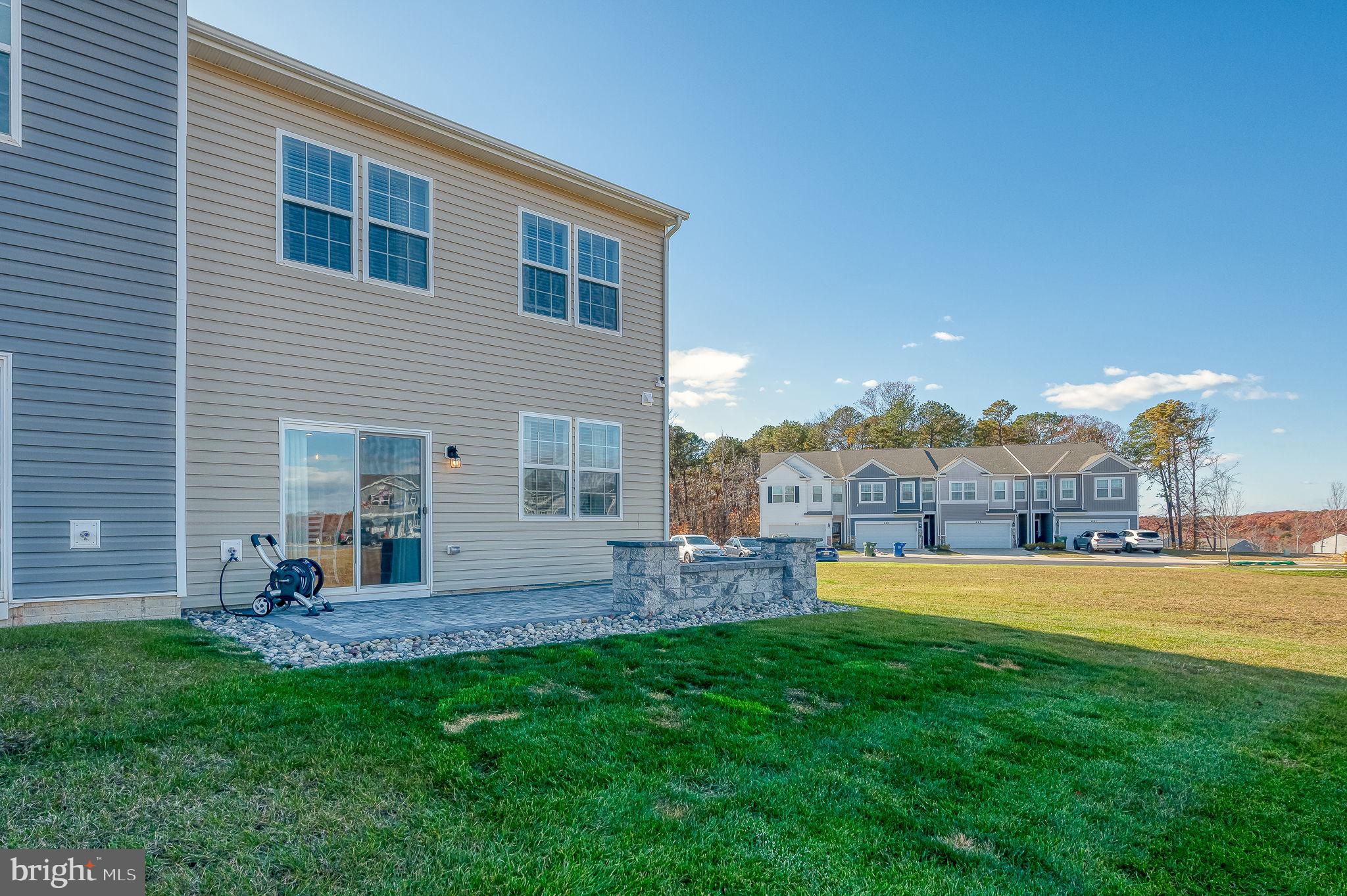 668 Beadlilly Way Joppa, MD 21085 - Photo 44 of 47 a view of a house with a yard and a large tree