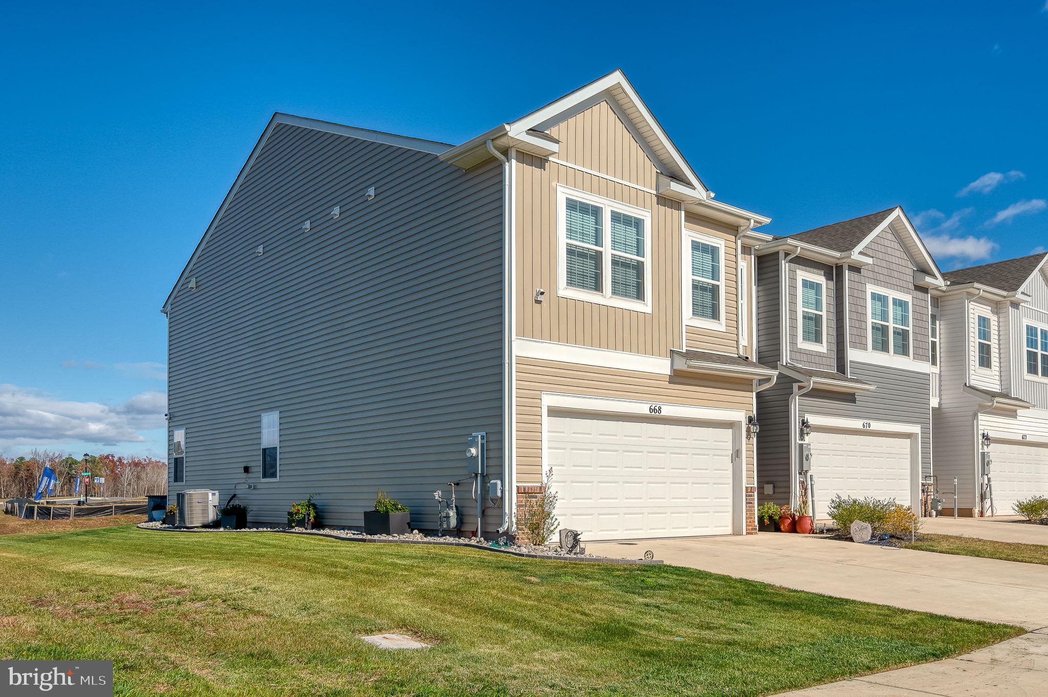 668 Beadlilly Way Joppa, MD 21085 - Photo 45 of 47 a front view of a house with a yard