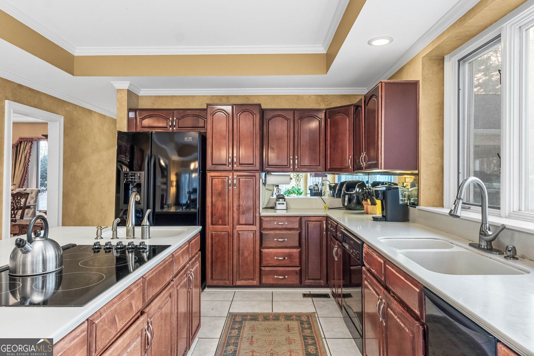 140 Thorne Ridge Trail Fayetteville, GA 30214 - Photo 14 of 44 a kitchen with stainless steel appliances granite countertop a sink stove and cabinets