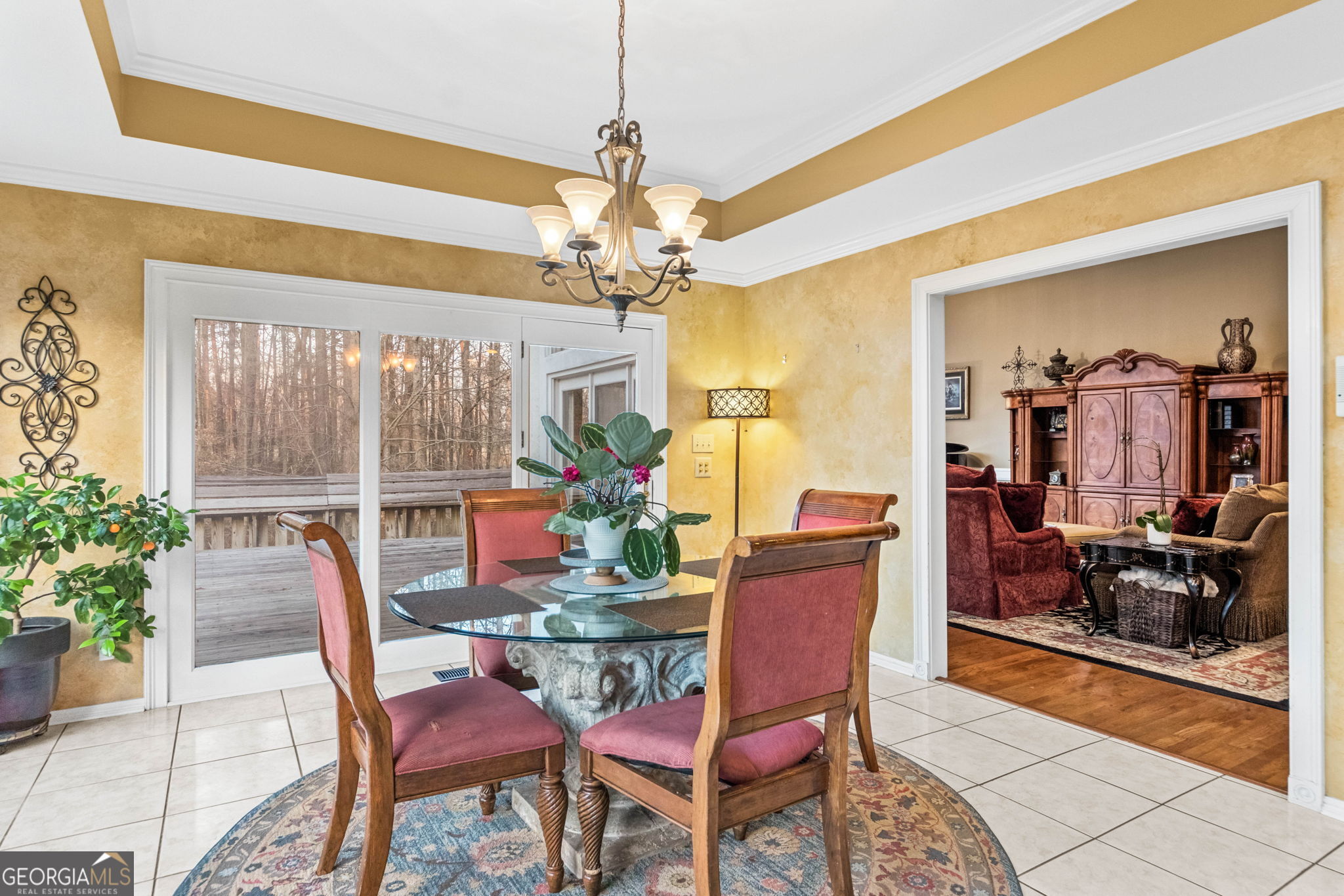 140 Thorne Ridge Trail Fayetteville, GA 30214 - Photo 17 of 44 a dining room with furniture a chandelier and window