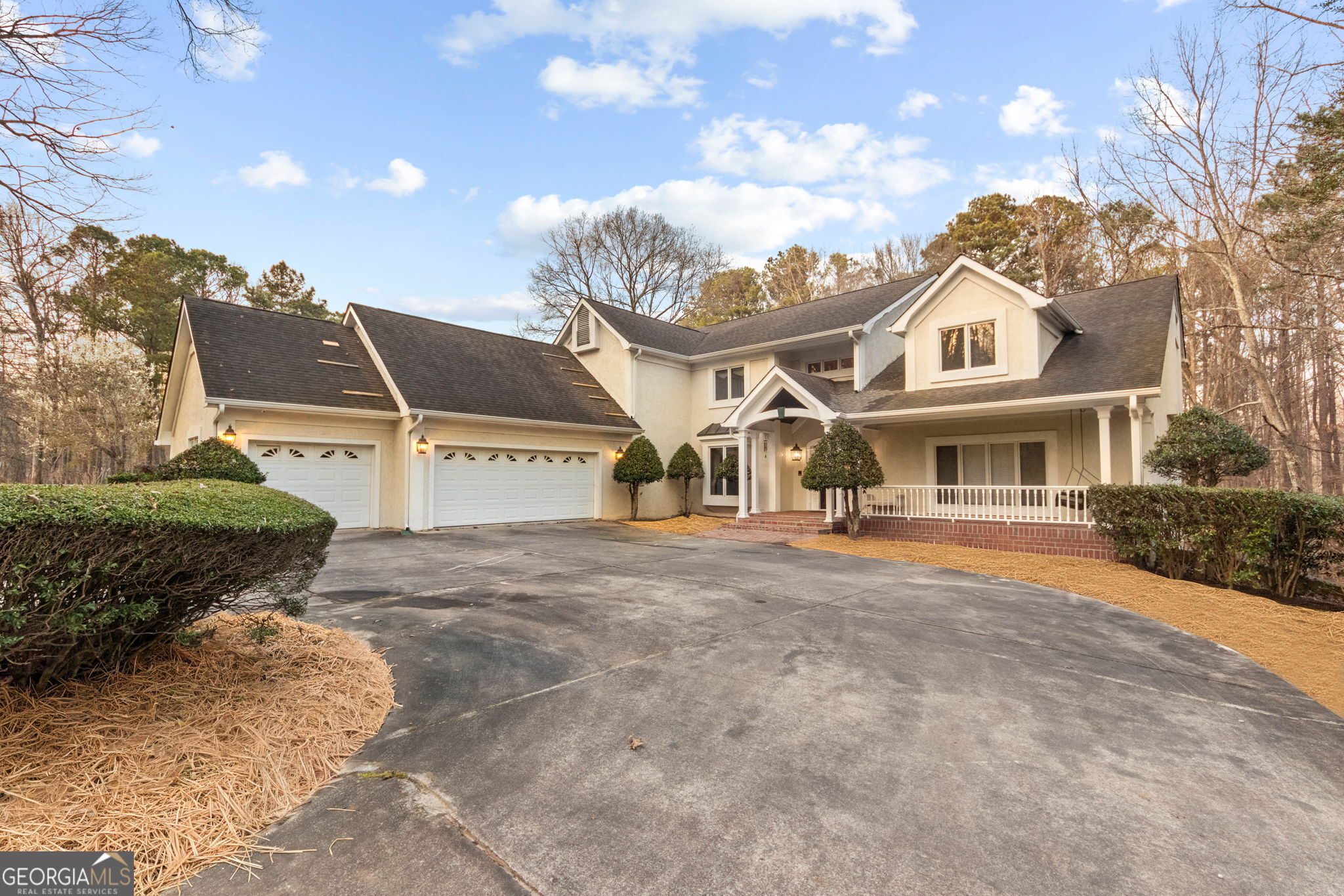 140 Thorne Ridge Trail Fayetteville, GA 30214 - Photo 2 of 44 a front view of a house with a yard and garage