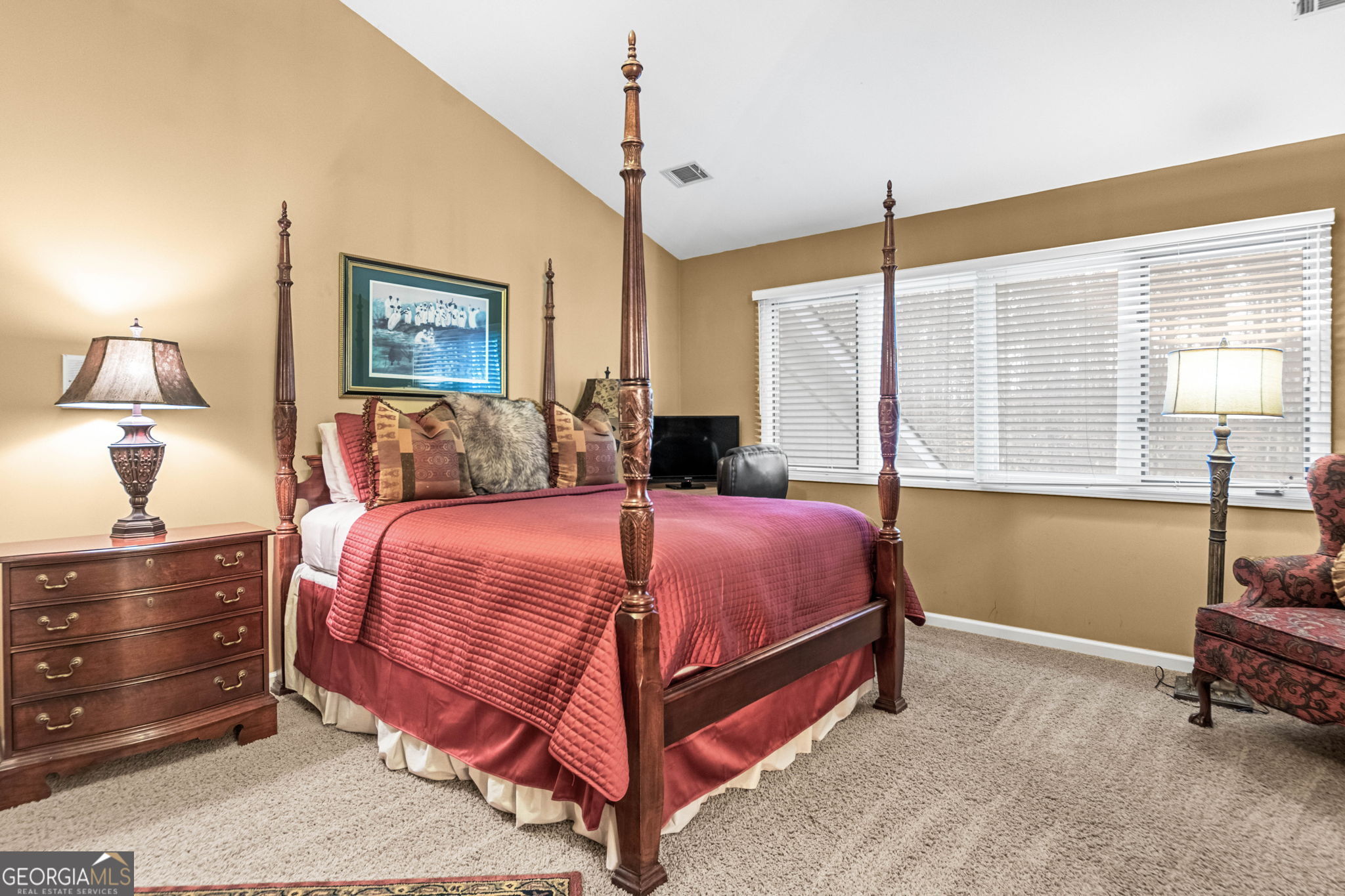140 Thorne Ridge Trail Fayetteville, GA 30214 - Photo 25 of 44 a bedroom with a bed and a dresser next to a window
