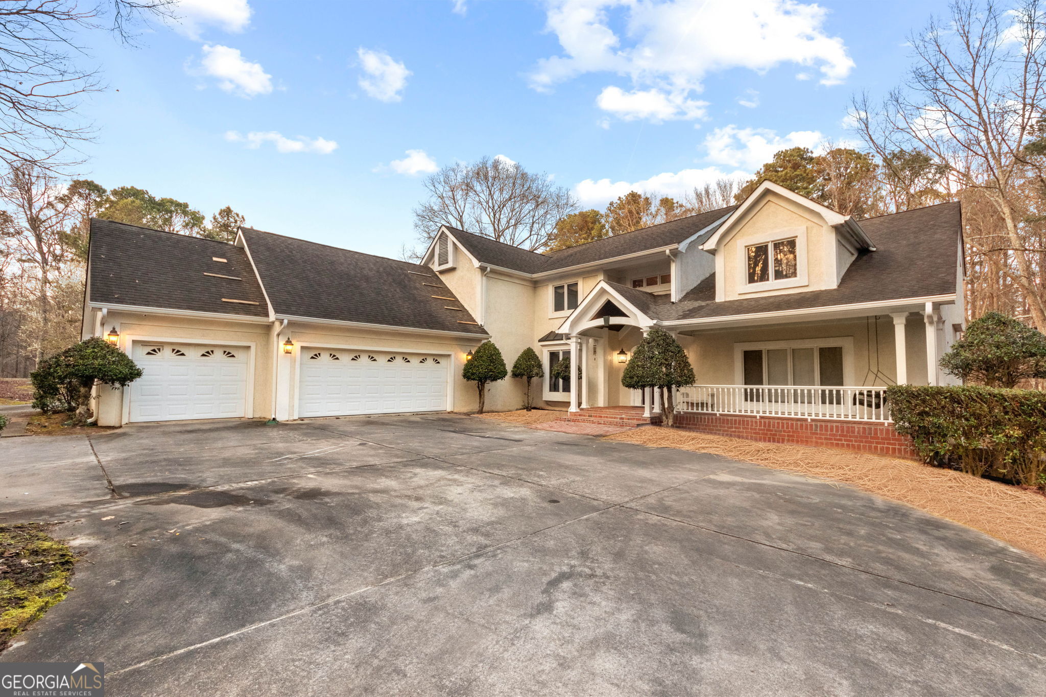 140 Thorne Ridge Trail Fayetteville, GA 30214 - Photo 3 of 44 a front view of a house with a yard and garage