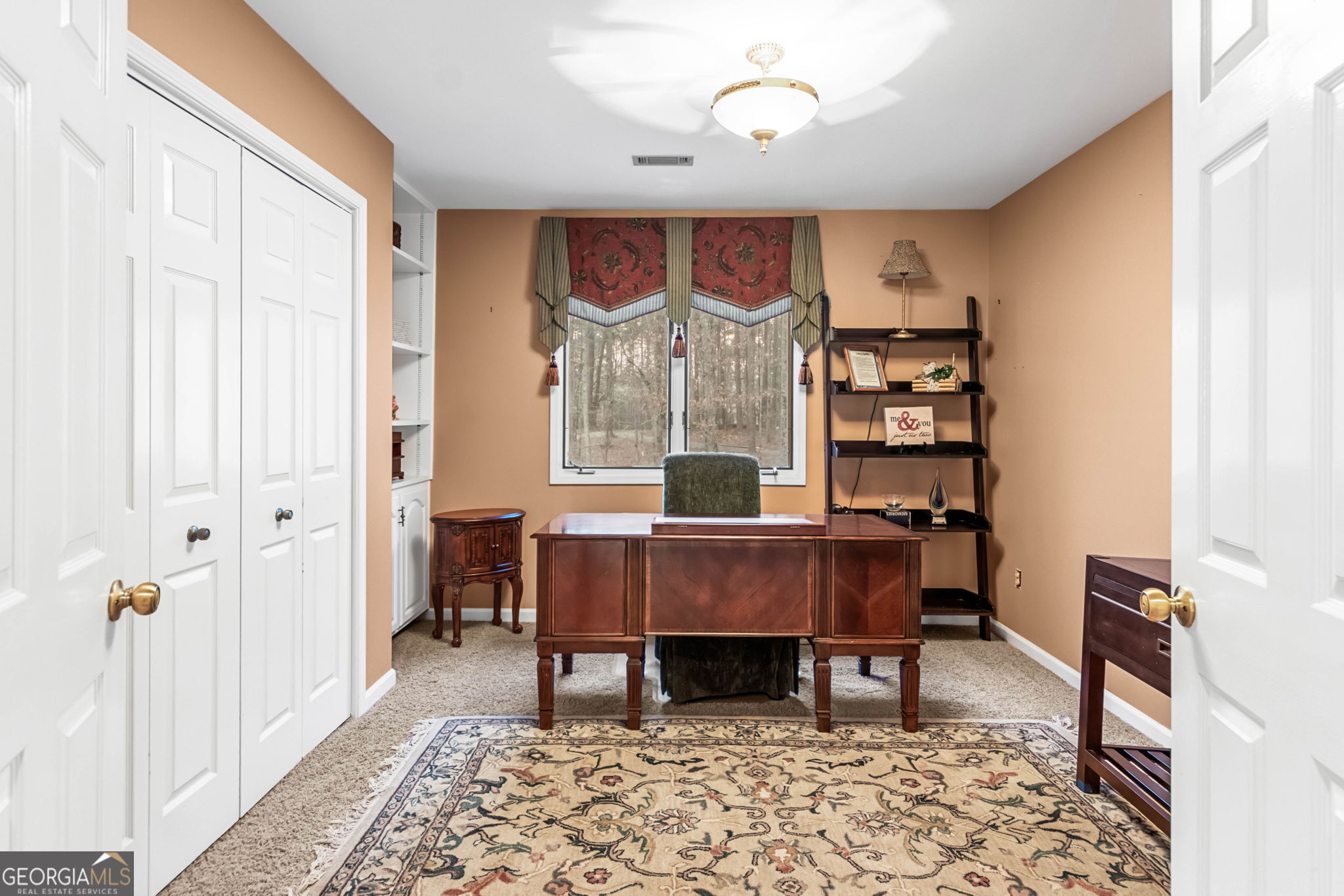 140 Thorne Ridge Trail Fayetteville, GA 30214 - Photo 32 of 44 a view of a workspace with furniture and a window