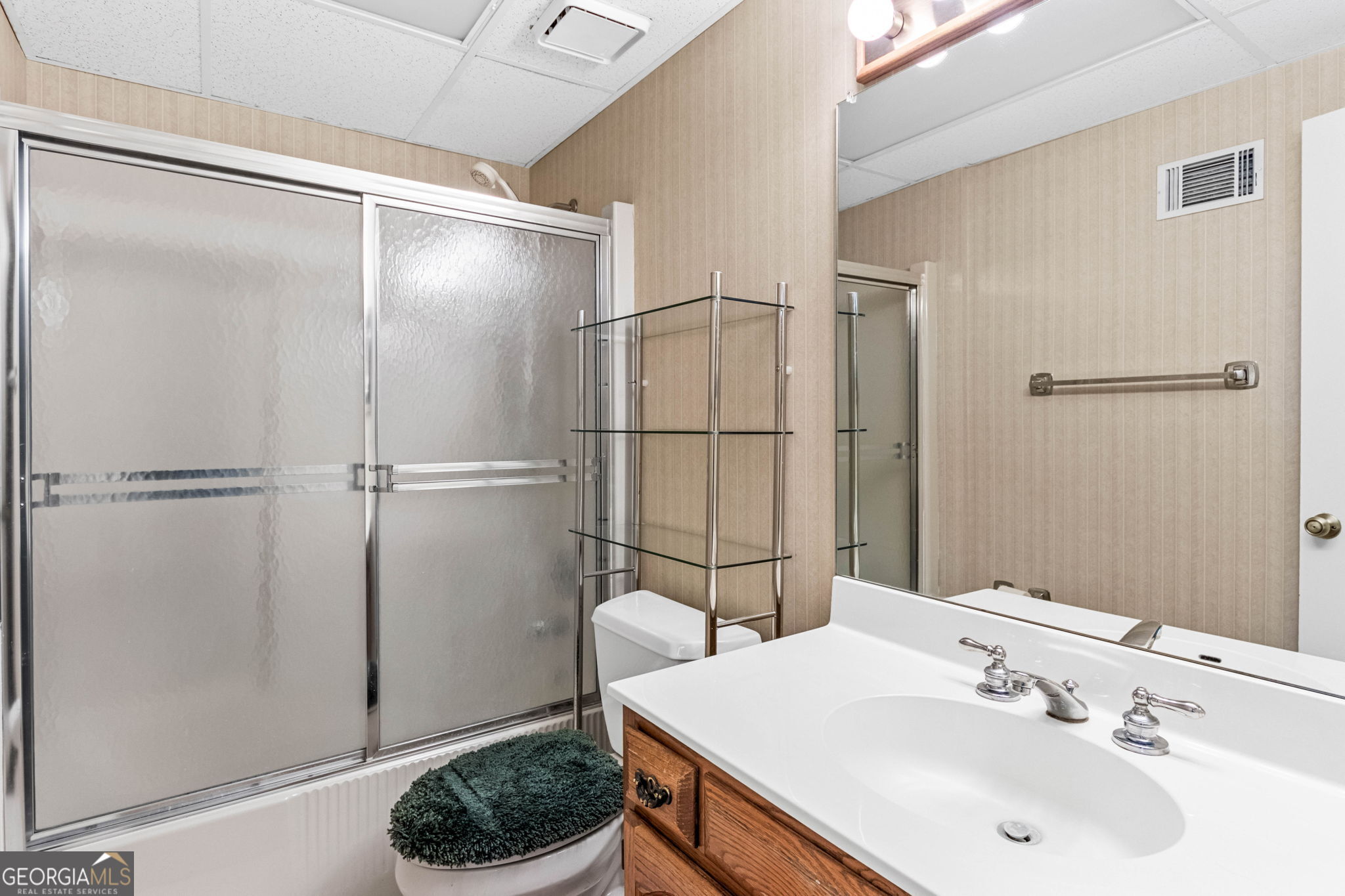 140 Thorne Ridge Trail Fayetteville, GA 30214 - Photo 37 of 44 a bathroom with a sink and a mirror