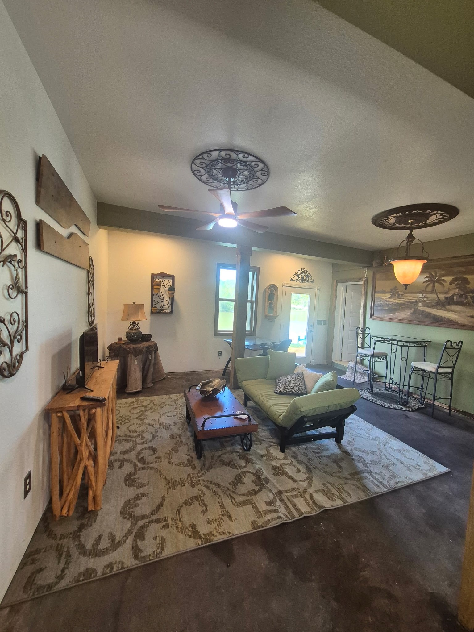 2503 River Crest, Unit 1 Houston, TX 77338 - Photo 8 of 23 a living room with furniture and a large window