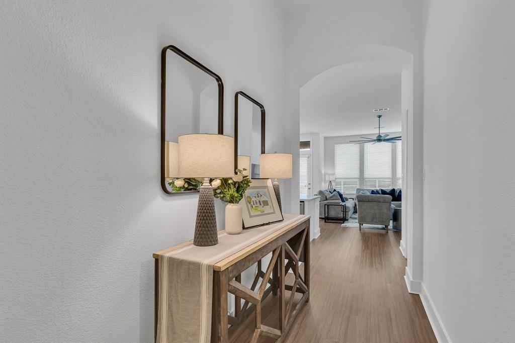 1817 Lockhart Drive Forney, TX 75126 - Photo 9 of 32 a view of living room with furniture and wooden floor