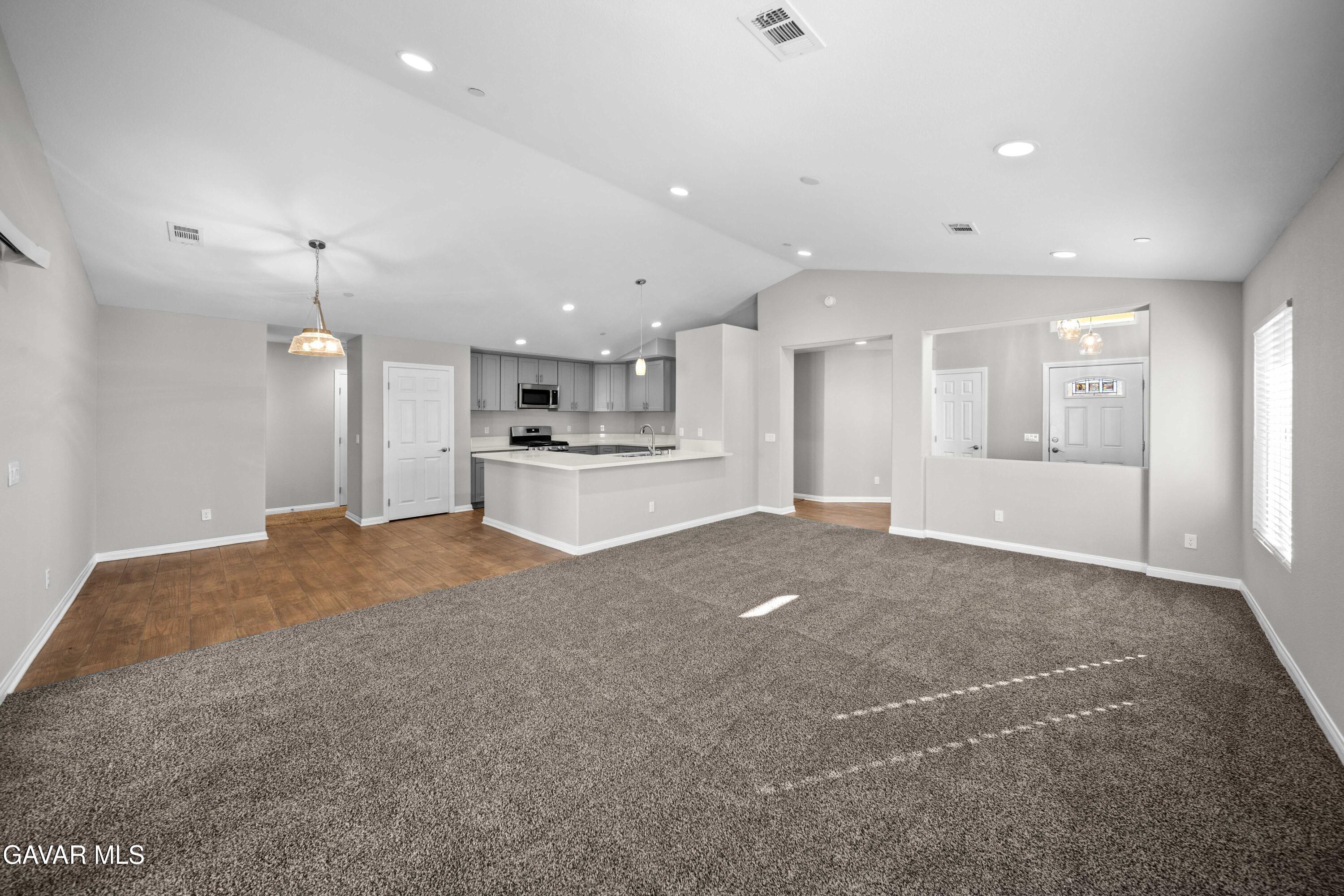 2009 Jenner Street Lancaster, CA 93535 - Photo 7 of 15 a view of a kitchen with a sink and cabinets