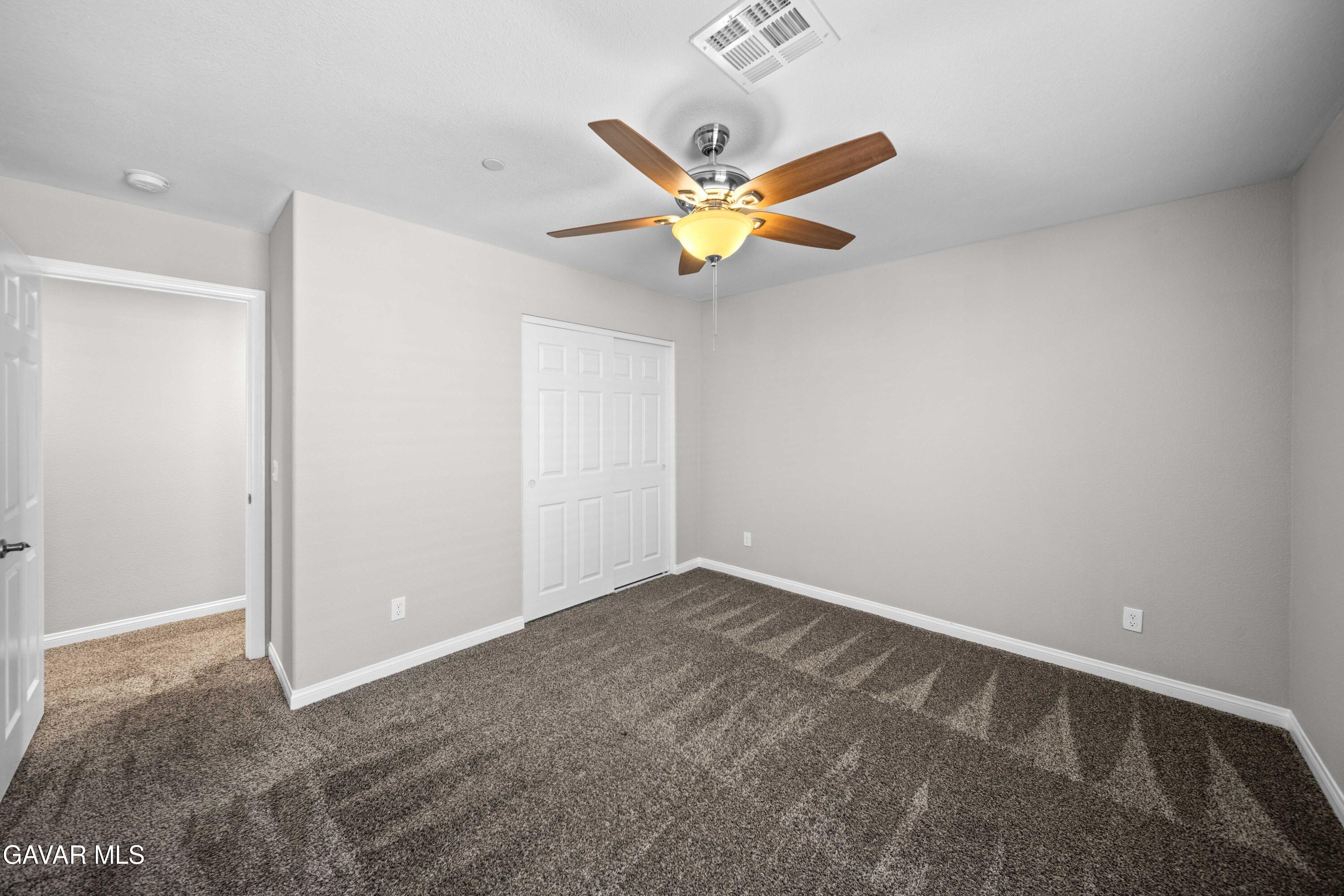 2009 Jenner Street Lancaster, CA 93535 - Photo 8 of 15 a view of an empty room with a window