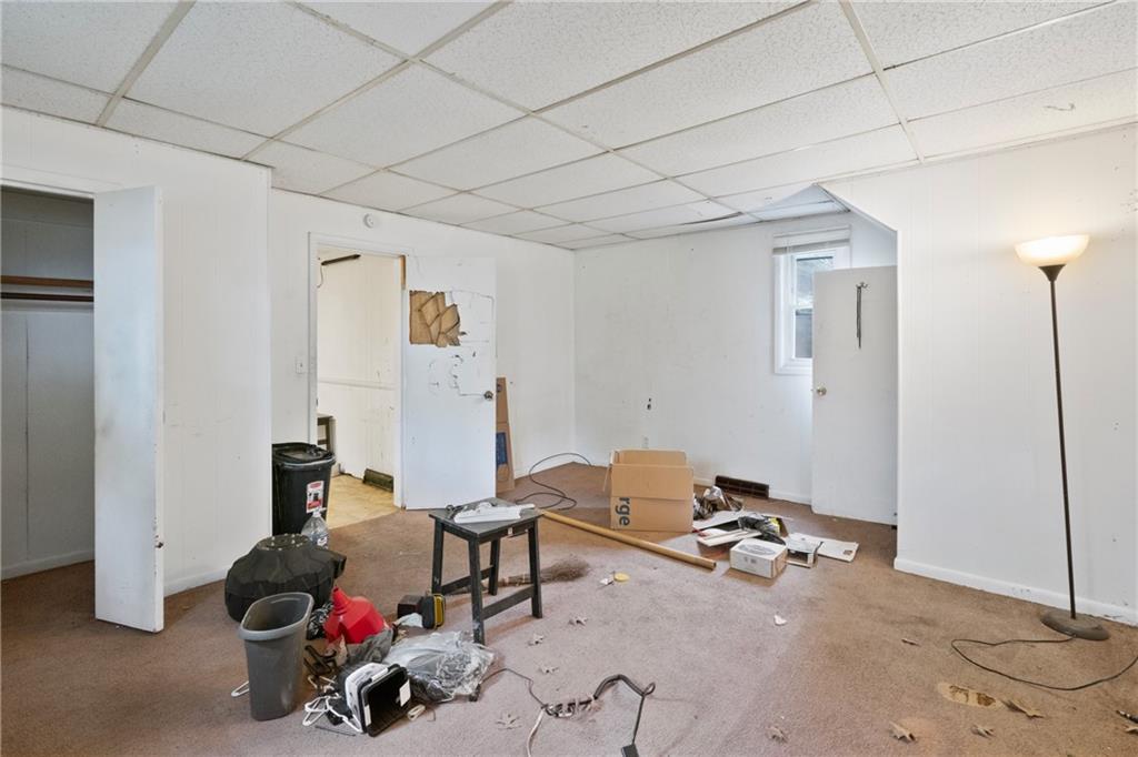 525 Larimer Avenue Turtle Creek, PA 15145 - Photo 12 of 28 a living room with furniture and a window