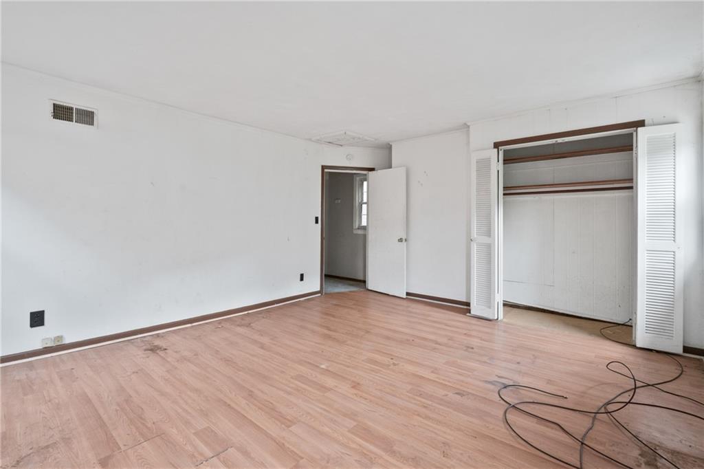 525 Larimer Avenue Turtle Creek, PA 15145 - Photo 17 of 28 an empty room with closet