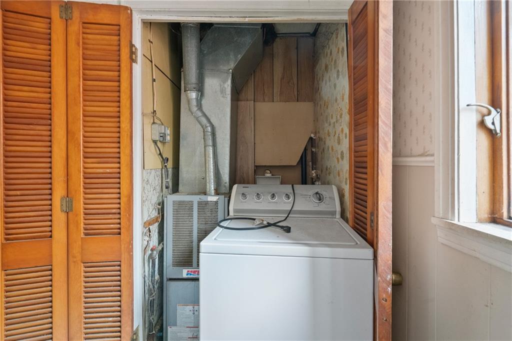 525 Larimer Avenue Turtle Creek, PA 15145 - Photo 23 of 28 a utility room with dryer and washer