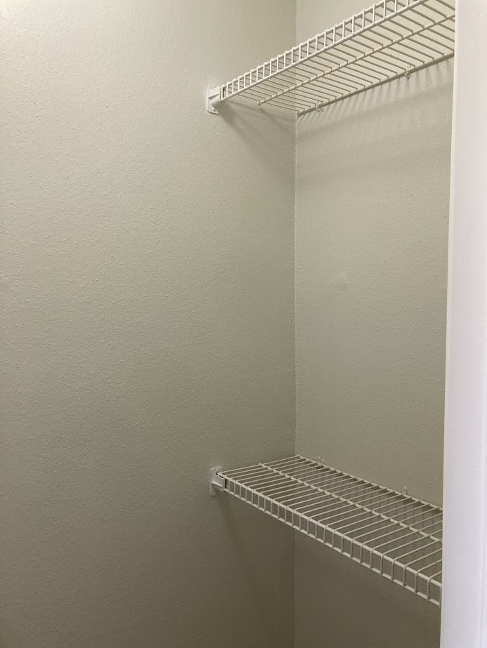 3075 Walnut Bend Lane, Unit 33 Houston, TX 77042 - Photo 15 of 25 a view of a room with racks on the wall