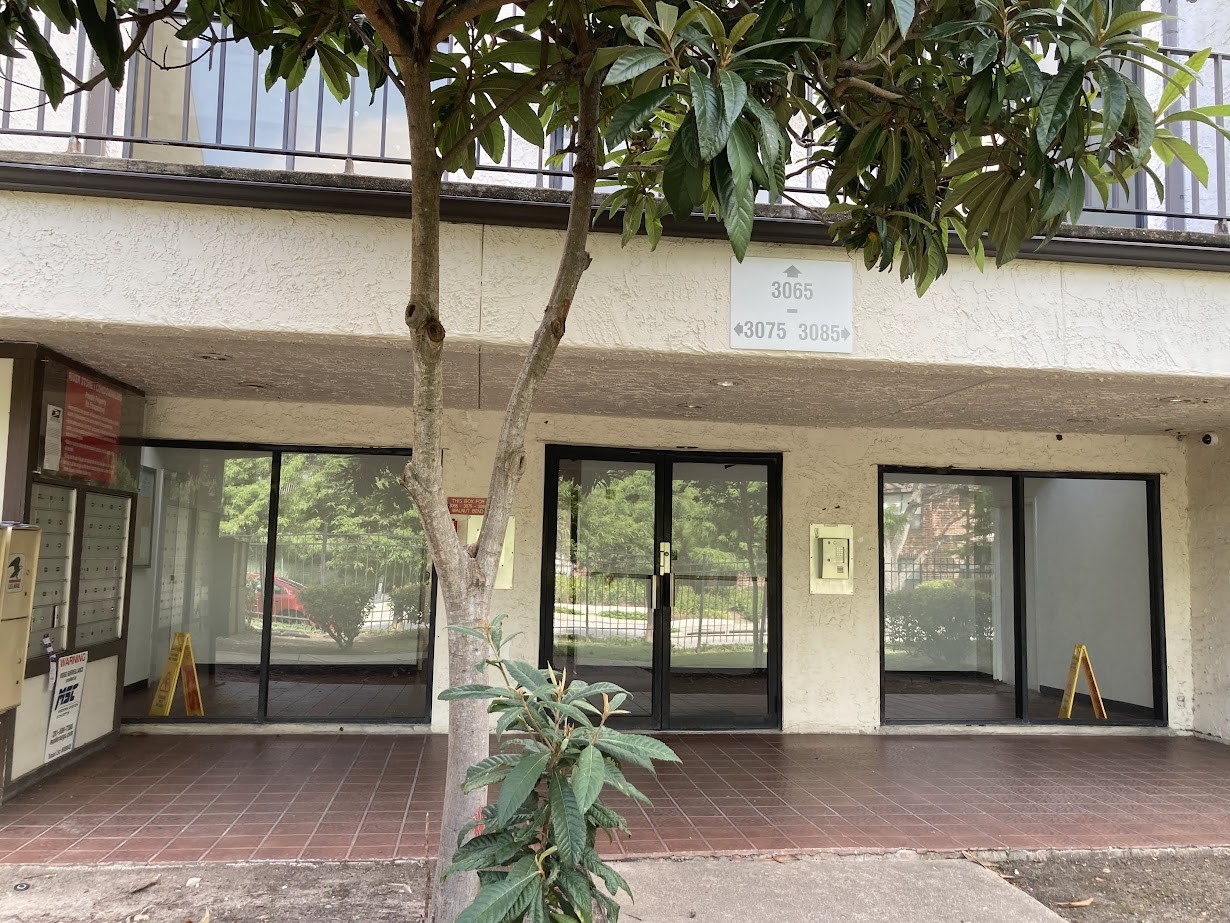 3075 Walnut Bend Lane, Unit 33 Houston, TX 77042 - Photo 2 of 25 a house view with a garden space