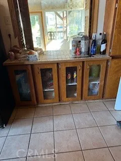 a kitchen with a sink a stove and a microwave