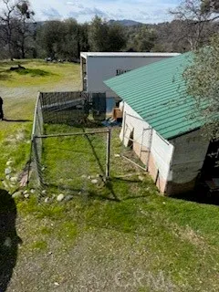 a view of a lake with a yard