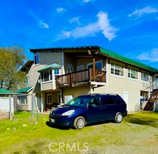 a car parked in front of a house