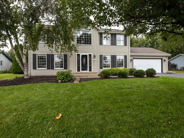 530 Pin Oak Road Rockton, IL 61072 - Photo 1 of 33 a front view of a house with a garden