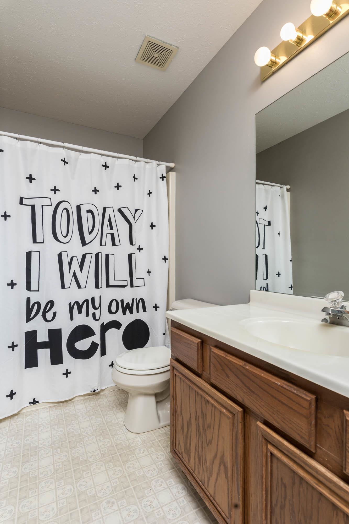 530 Pin Oak Road Rockton, IL 61072 - Photo 27 of 33 a bathroom with a granite countertop sink and a toilet