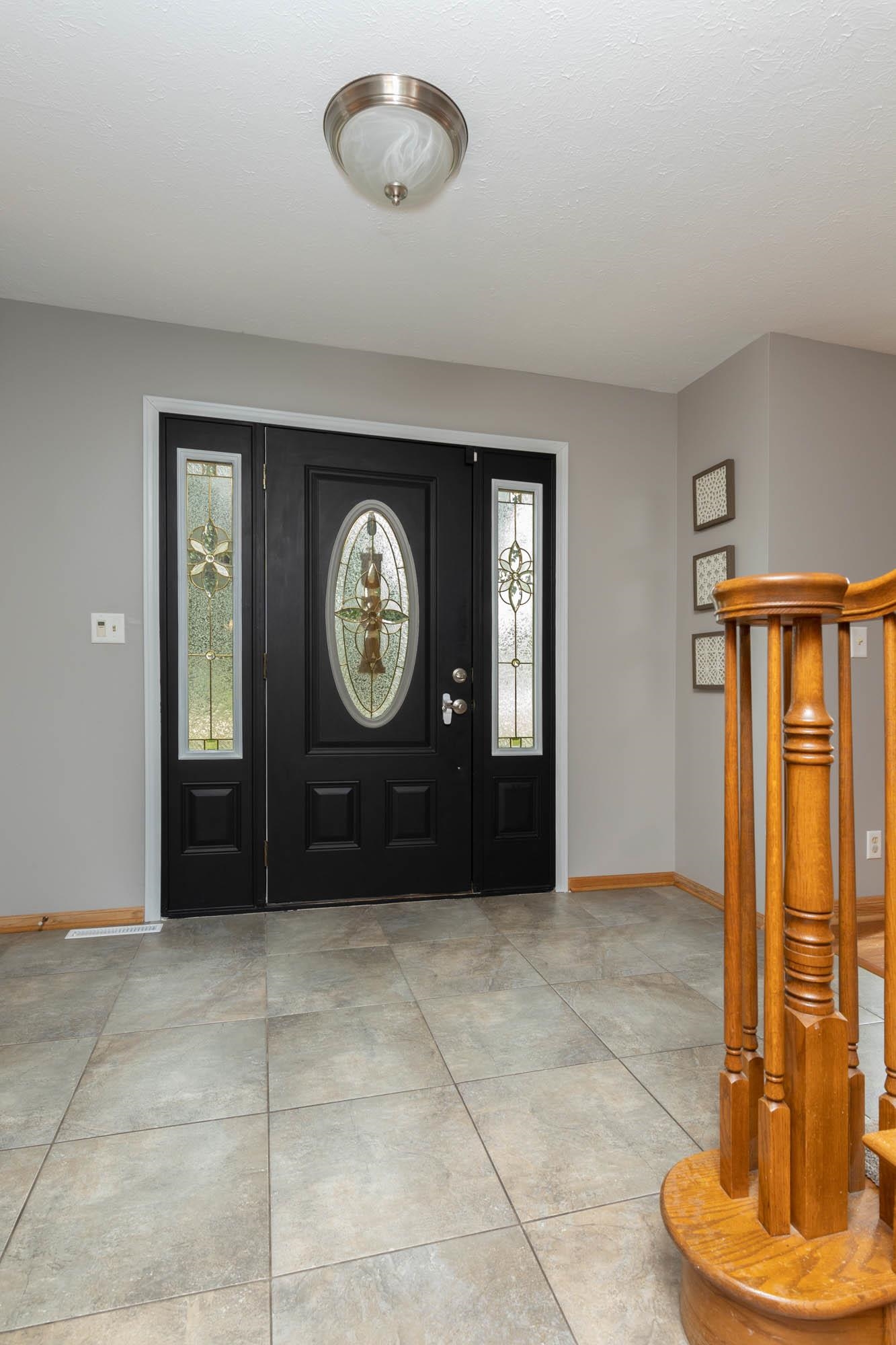 530 Pin Oak Road Rockton, IL 61072 - Photo 4 of 33 a view of a hallway with entryway door