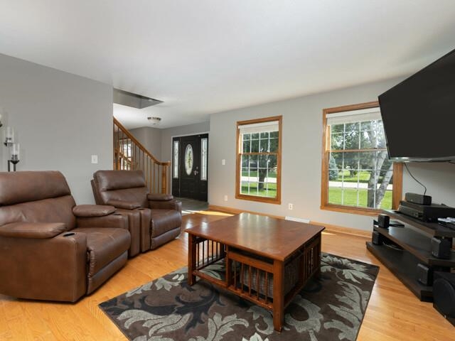 530 Pin Oak Road Rockton, IL 61072 - Photo 7 of 33 a living room with furniture and a flat screen tv