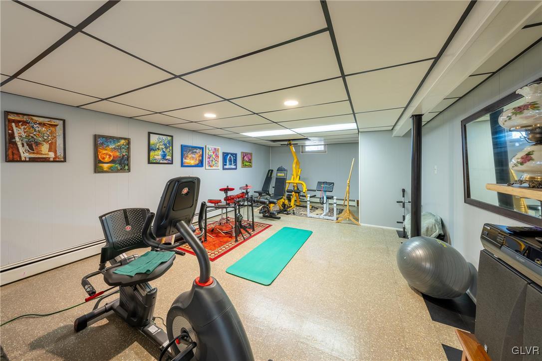 70 Colonial Road Allentown, PA 18109 - Photo 19 of 32 a room with furniture and a flat screen tv