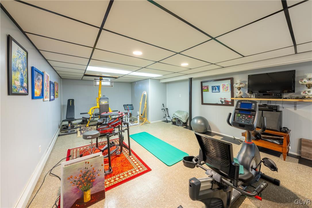 70 Colonial Road Allentown, PA 18109 - Photo 20 of 32 a room with furniture and a flat screen tv