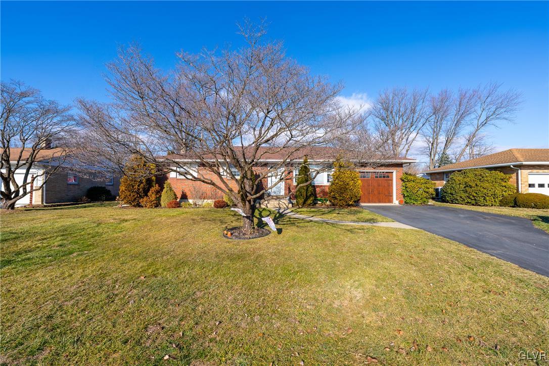 70 Colonial Road Allentown, PA 18109 - Photo 4 of 32 a view of road with large trees