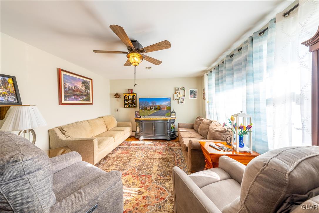 70 Colonial Road Allentown, PA 18109 - Photo 6 of 32 a living room with furniture and a large window