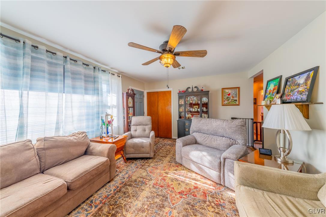 70 Colonial Road Allentown, PA 18109 - Photo 7 of 32 a living room with furniture and a large window