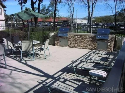 a view of a terrace with sitting area